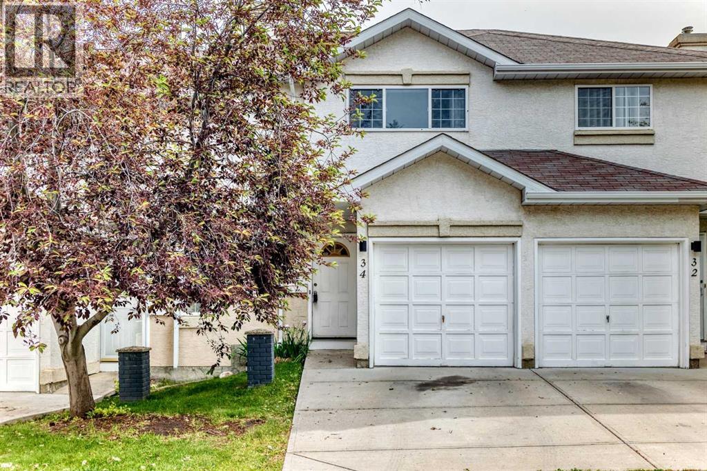 Row / Townhouse for Sale in 34 Shawinigan Lane SW|Calgary, Alberta T2Y2B5