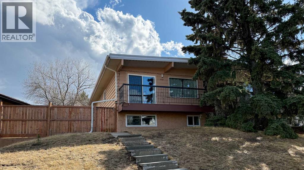 Duplex for Sale in 11723 Canfield Road SW|Calgary, Alberta T2W1J6