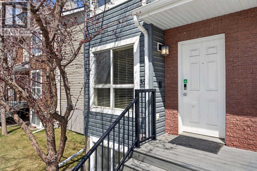 Row / Townhouse for Sale in 32 Erin Woods Court SE|Calgary, Alberta T2B3V6 3