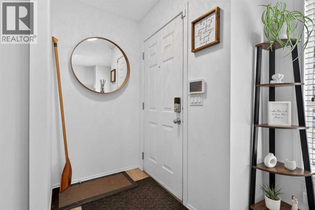Row / Townhouse for Sale in 32 Erin Woods Court SE|Calgary, Alberta T2B3V6 4