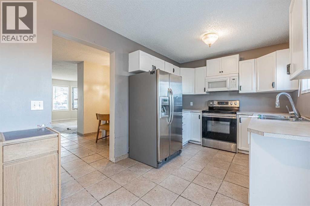 Row / Townhouse for Sale in 68 Abbeydale Villas NE|Calgary, Alberta T2A7P6 4