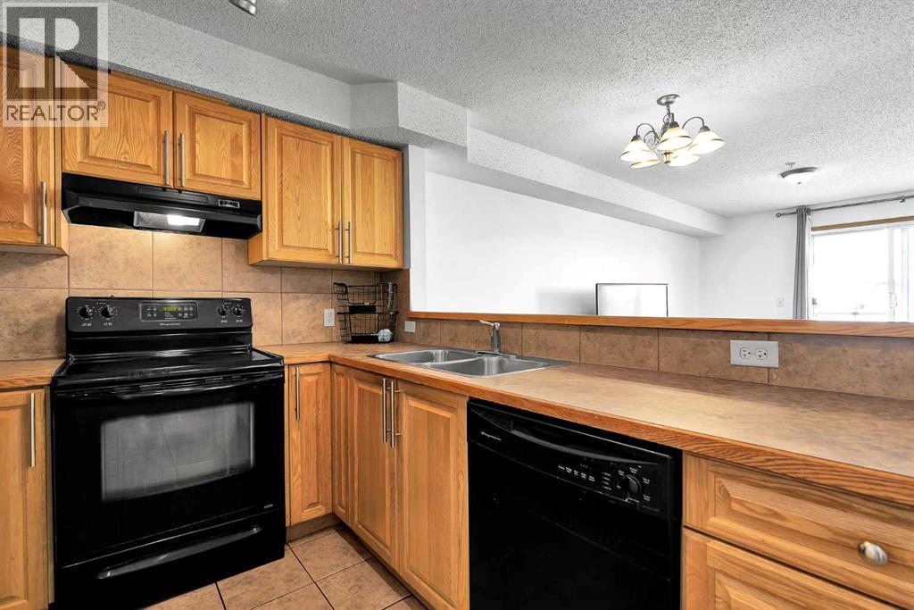 Apartment for Sale in 218, 92 Saddletree Court NE|Calgary, Alberta T3J0K9 4