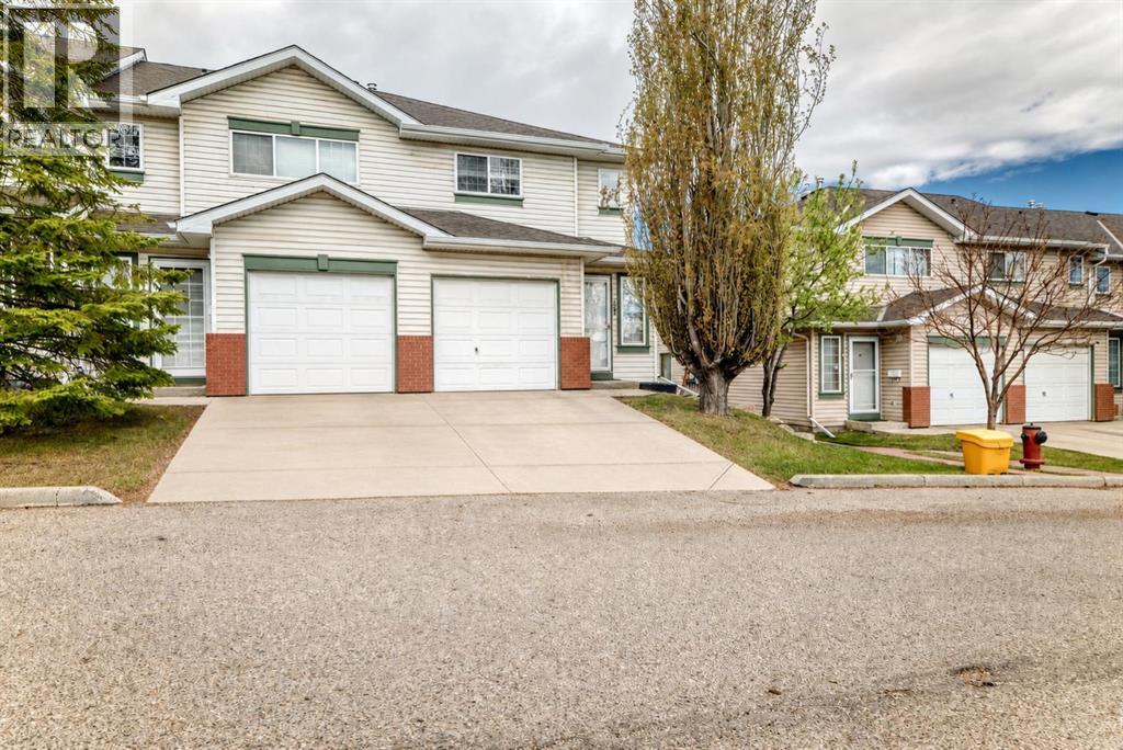 Row / Townhouse for Sale in 152 Country Hills Villas NW|Calgary, Alberta T3K4S8
