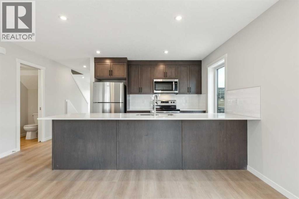 Row / Townhouse for Sale in 101, 63 Belmont Passage SW|Calgary, Alberta T2X4H7 4