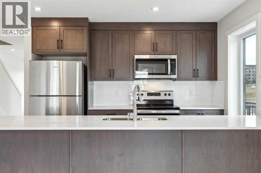 Row / Townhouse for Sale in 101, 63 Belmont Passage SW|Calgary, Alberta T2X4H7 5