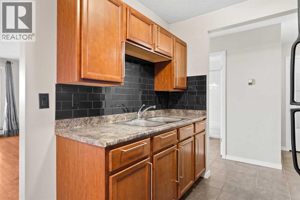 Apartment for Sale in 308, 1513 26 Avenue SW|Calgary, Alberta T2T1C4 5
