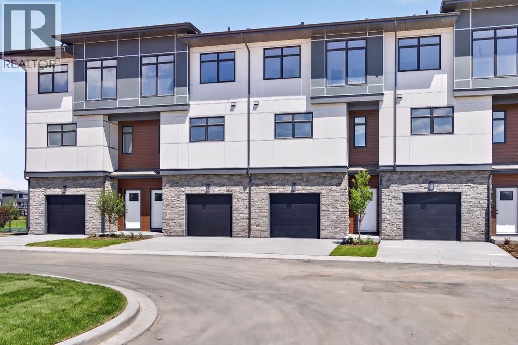 Row / Townhouse for Sale in 30 Creekside Villas SW|Calgary, Alberta T1T1Z1 2