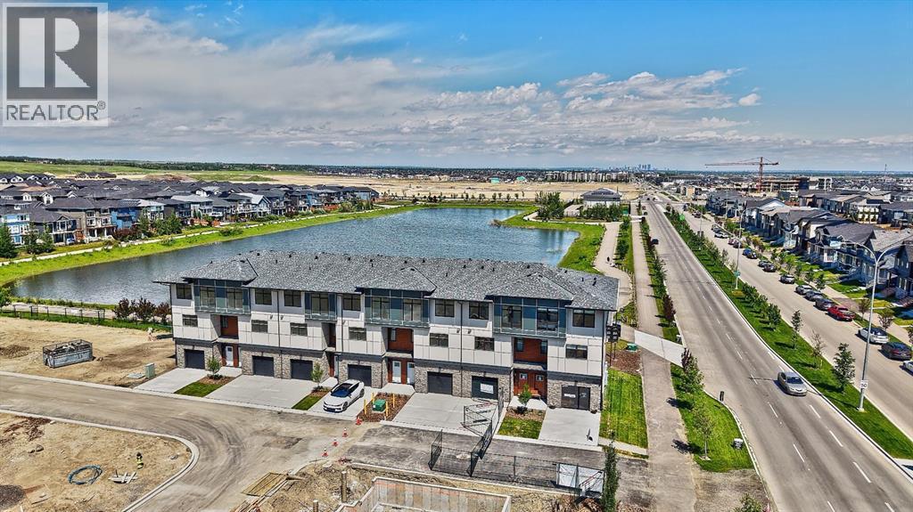 Row / Townhouse for Sale in 30 Creekside Villas SW|Calgary, Alberta T1T1Z1 3