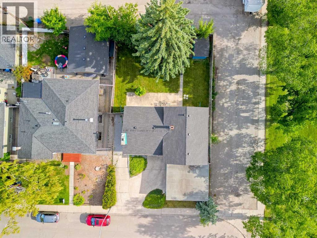 House for Sale in 67 Hooke Road SW|Calgary, Alberta T2V3K6 4