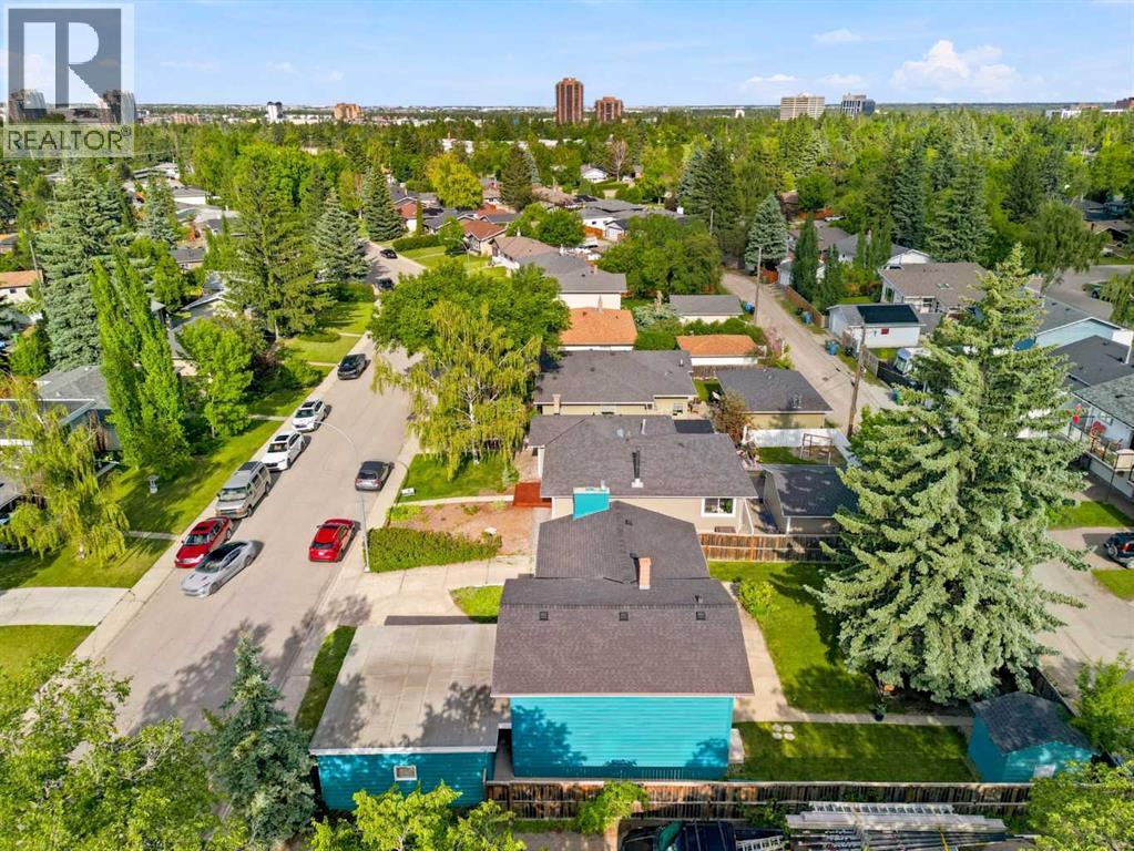 House for Sale in 67 Hooke Road SW|Calgary, Alberta T2V3K6 2