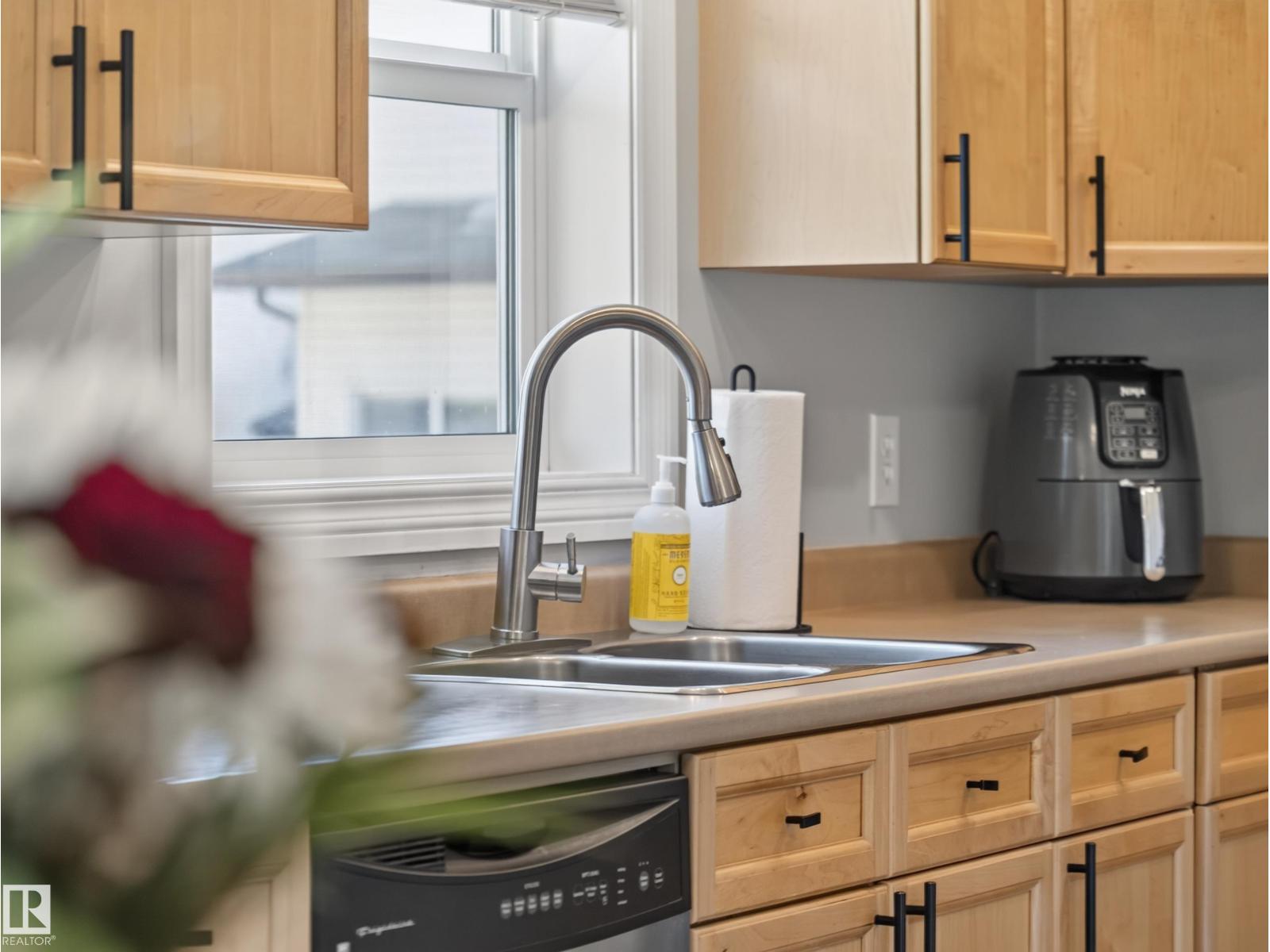 Kitchen sink detail with the window and counter