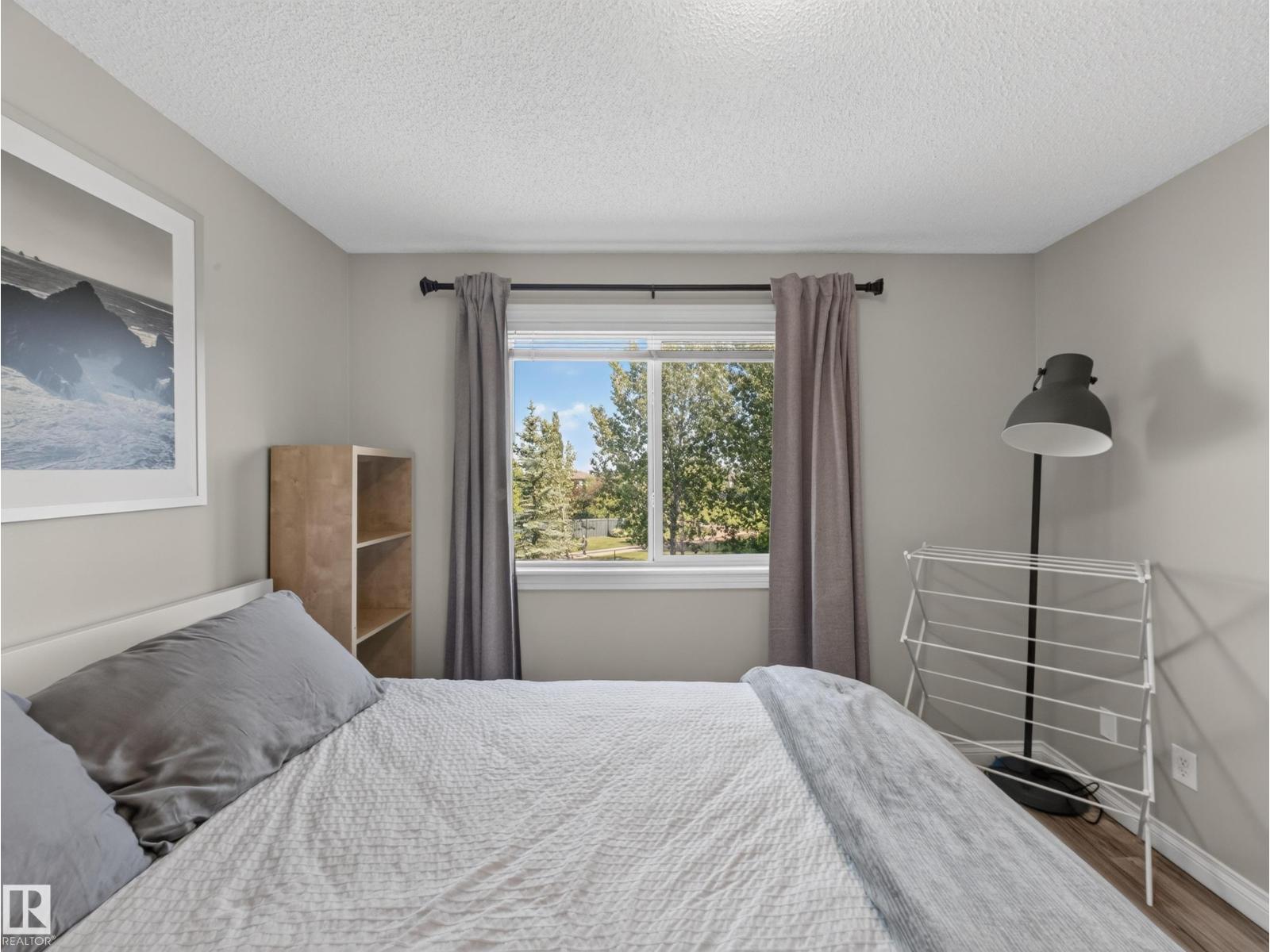 Bedroom with window and art