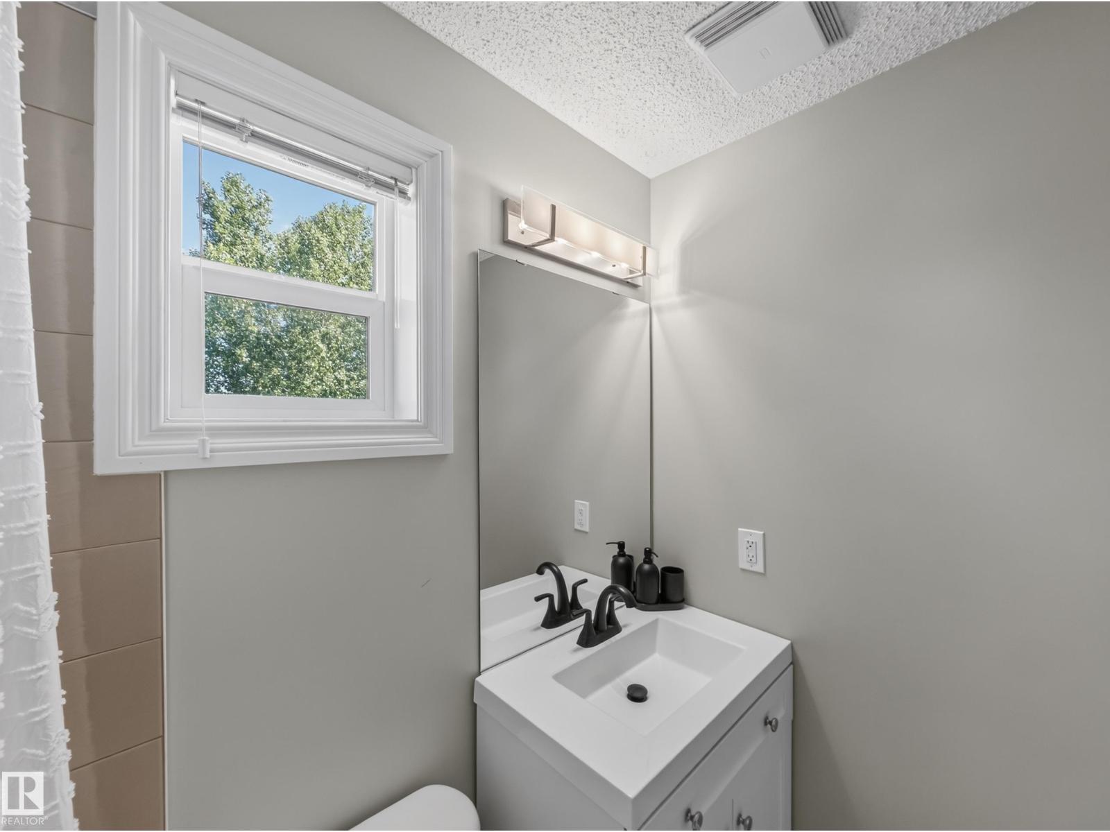 Second bath vanity with window