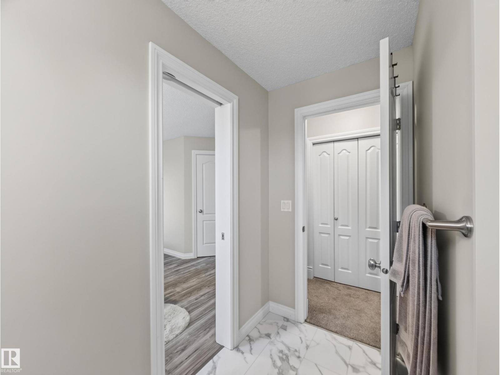Hall to the linen closet and bath
