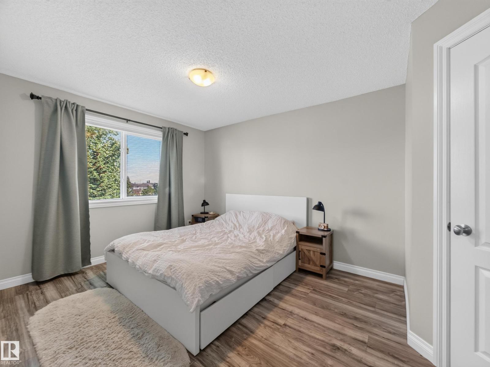 Second bedroom with bed and window