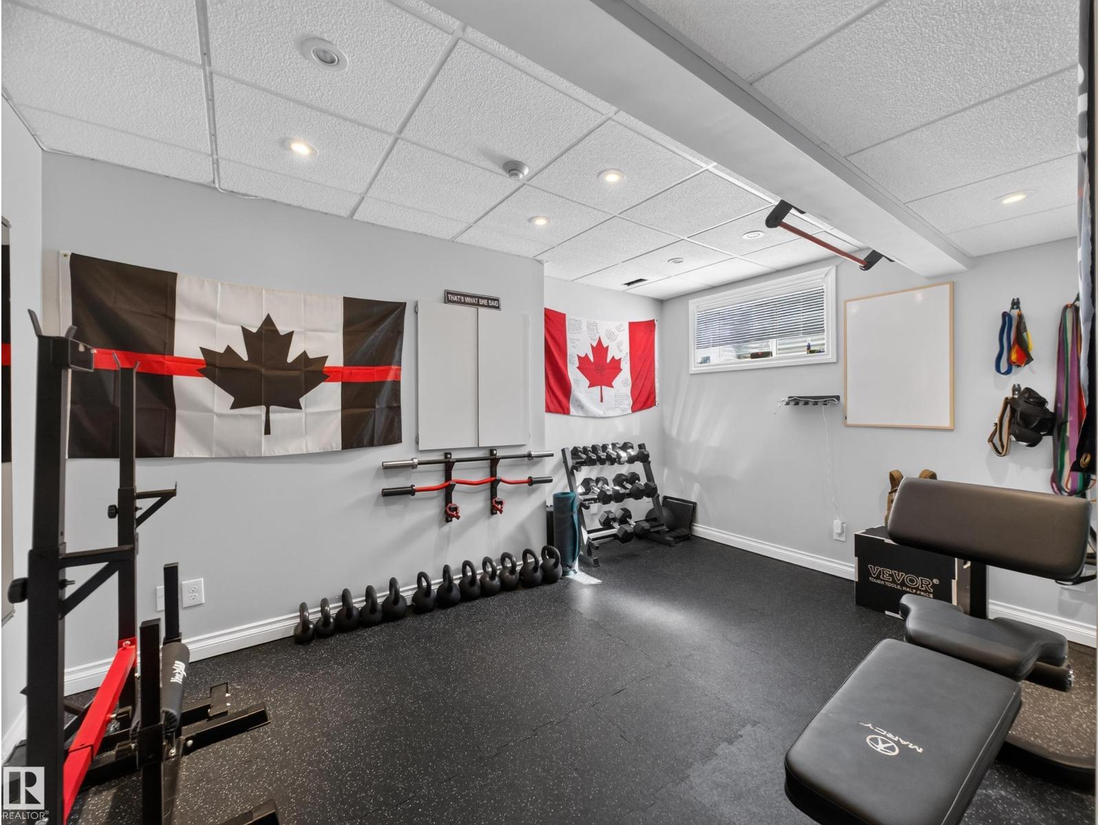 Fully finished basement, currently set up as a home gym