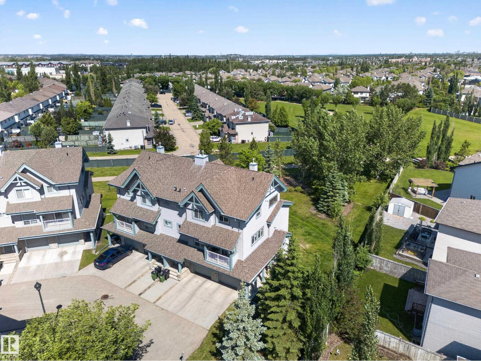 Aerial view of the home and street